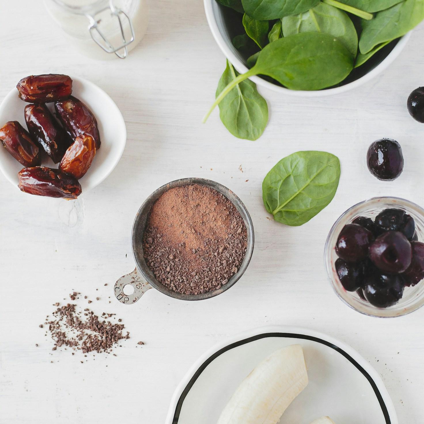 Community members collaborating in a contemporary kitchen, exchanging recipes and techniques